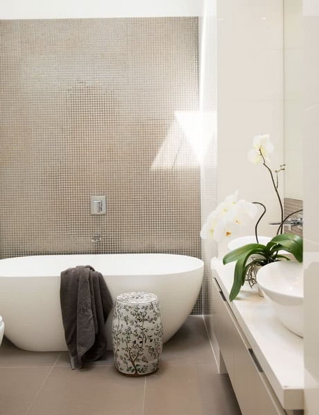 Latest Bathroom Designs / 51 Modern Bathroom Design Ideas Plus Tips On How To Accessorize Yours - The gold hardware looks luxurious over white tiles.