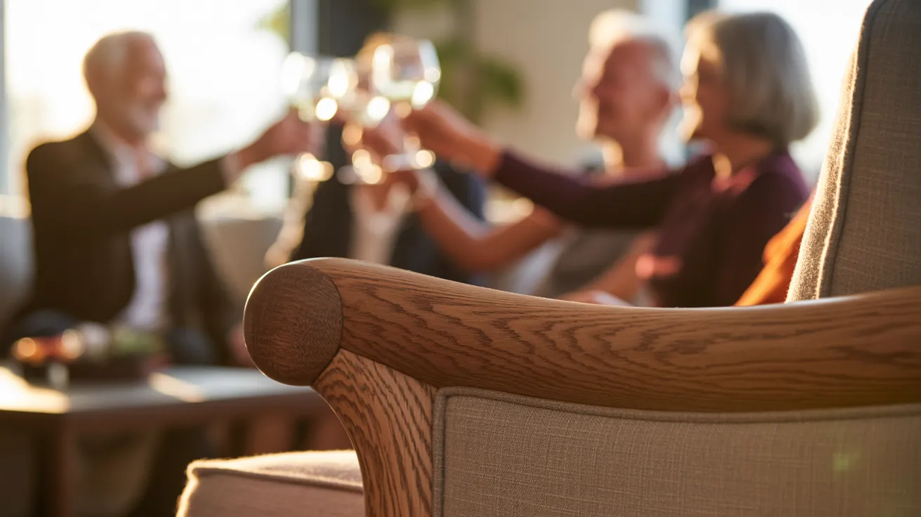 A close-up of an artisan-crafted wooden sofa armrest in warm light, with the blurred shapes of people toasting in the background.